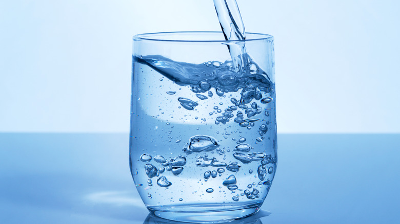 water being poured into glass