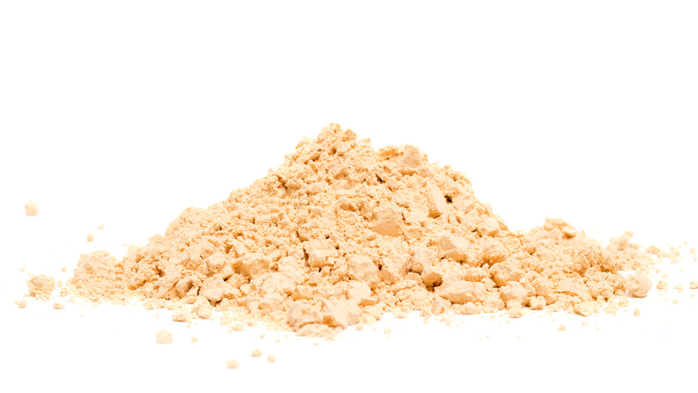 peanut butter powder with a white background 