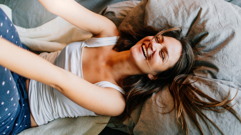 woman in bed with messy hair