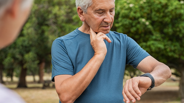 Man checking heart rate