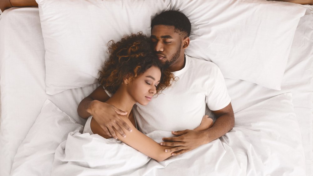 sleeping position of couple in a relationship
