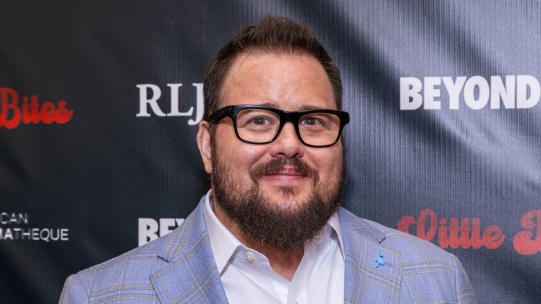Chaz Bono smiling and posing at a celebrity event