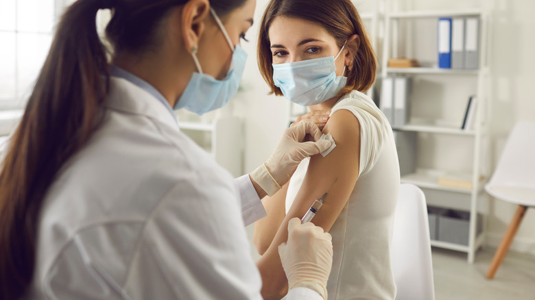 woman getting vaccinated