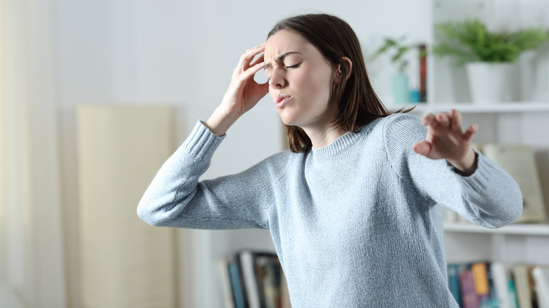 Woman feeling dizzy 