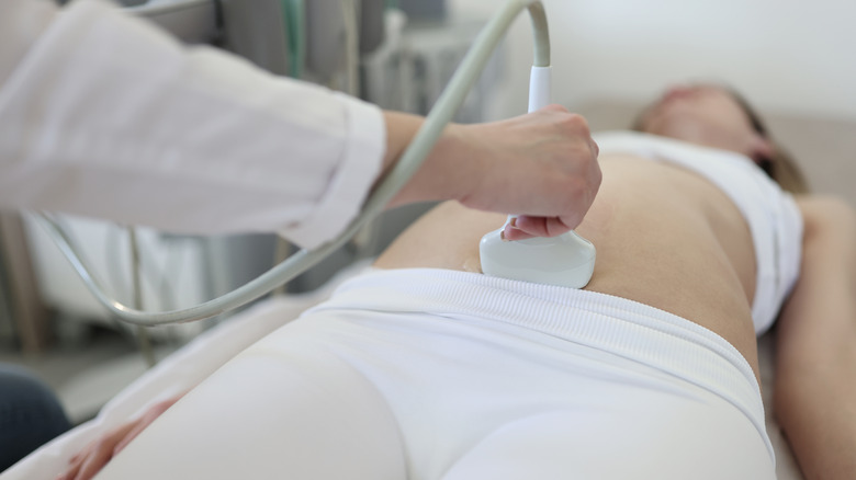 Pregnant woman with ultrasound