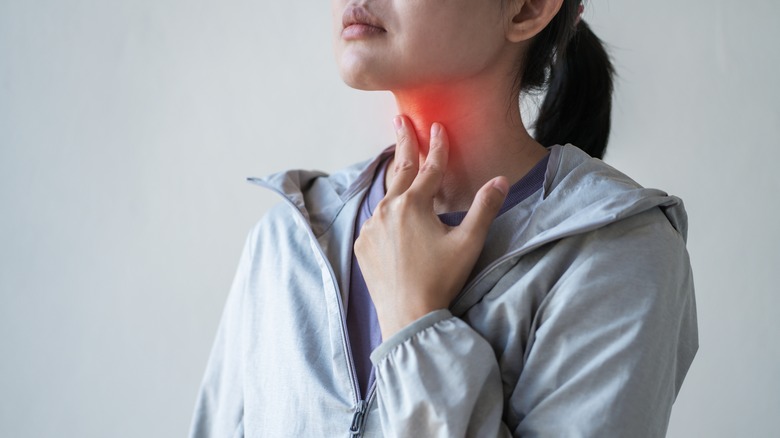 woman with inflamed throat