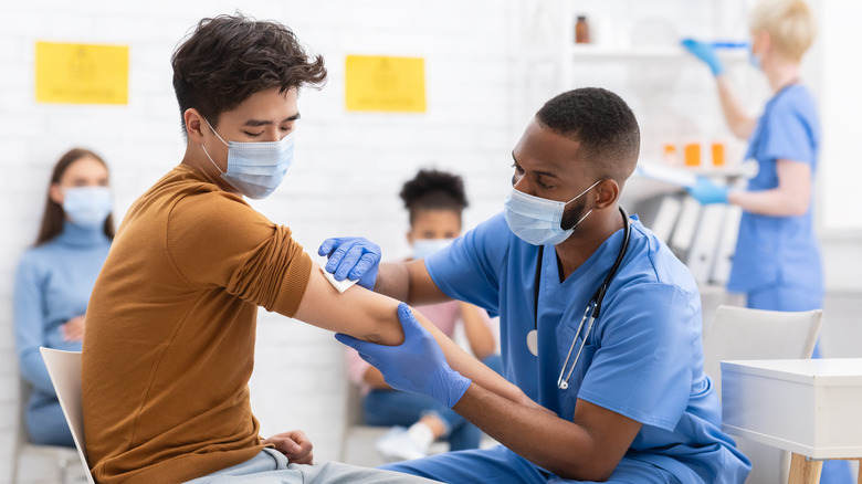 man getting vaccine