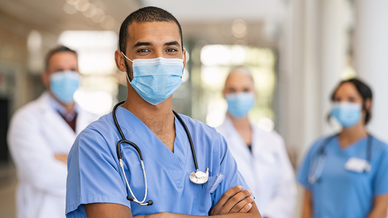 nurses health staff wearing masks at hospital