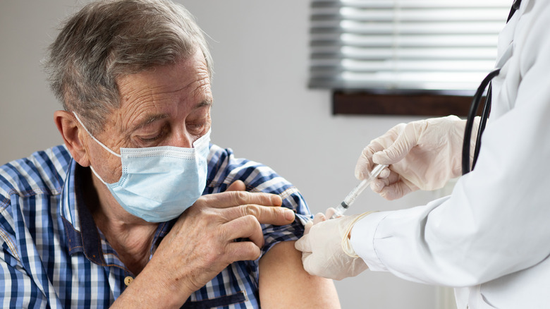 Man receiving vaccine