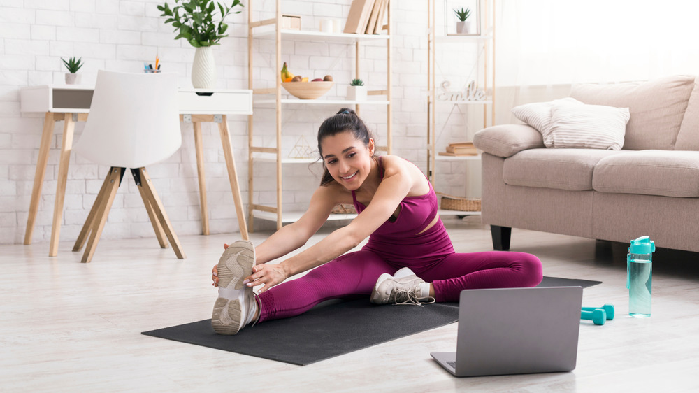 Woman stretching after workout 