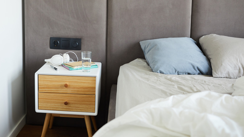 glass of water on a bedside table