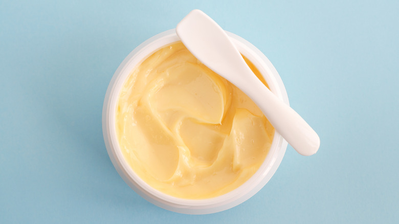 Bowl of butter with small spatula