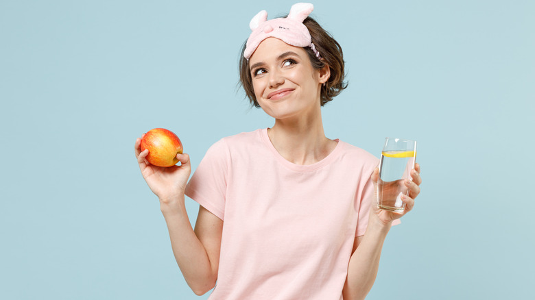 woman with an apple