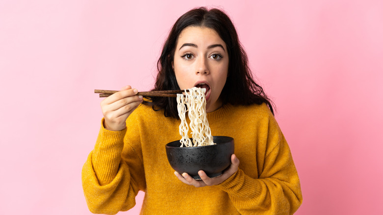 woman eating ramen