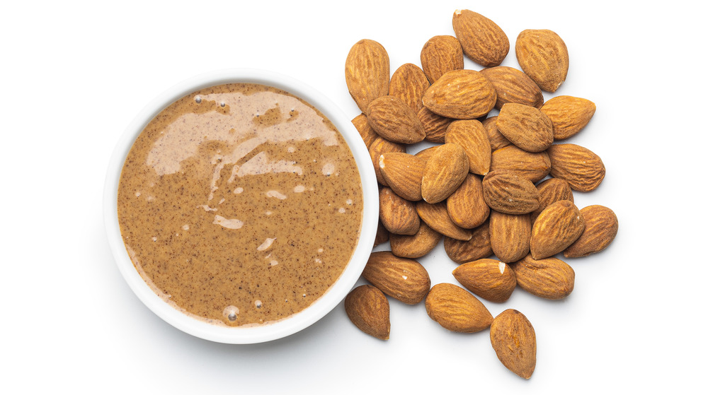 Bowl of almonds with almond butter