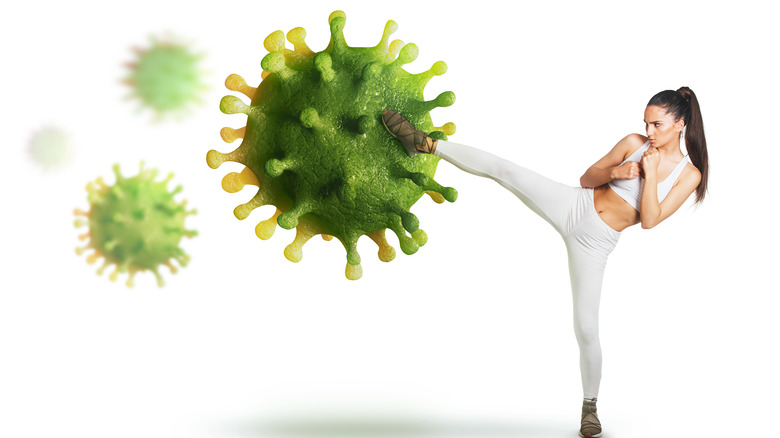 woman kicking infection spores
