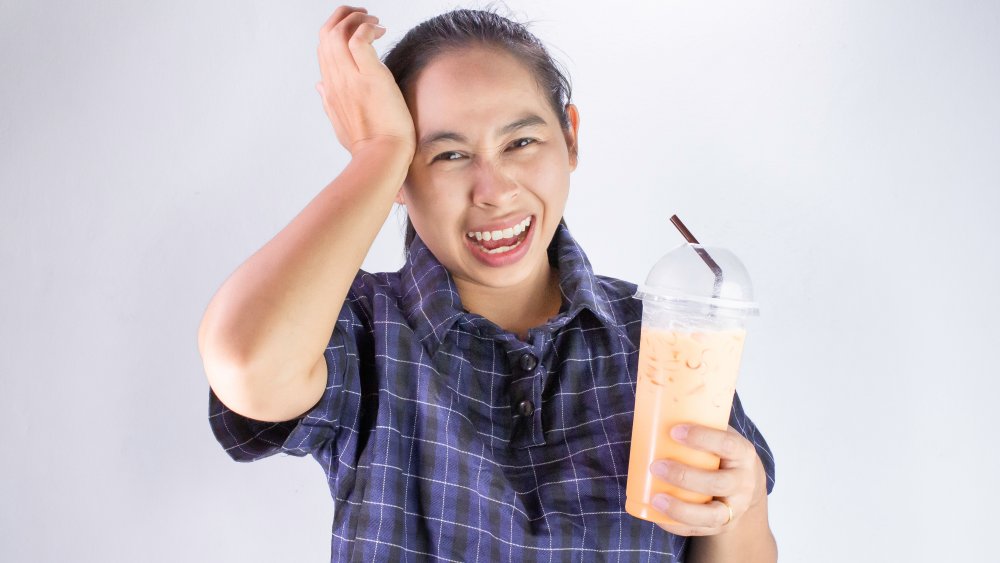 Woman with brain freeze