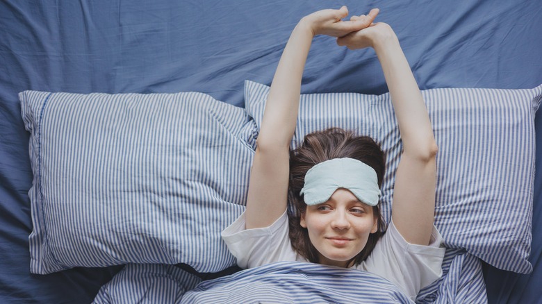 Woman waking up from sleep