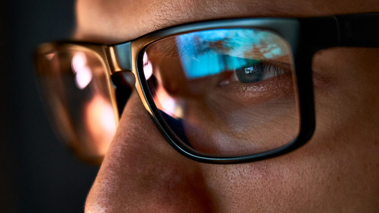 man looking at screen
