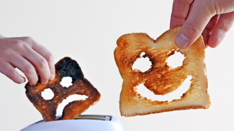 slices of bread cut into happy and sad faces