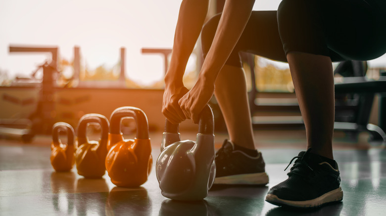 lifting a kettlebell