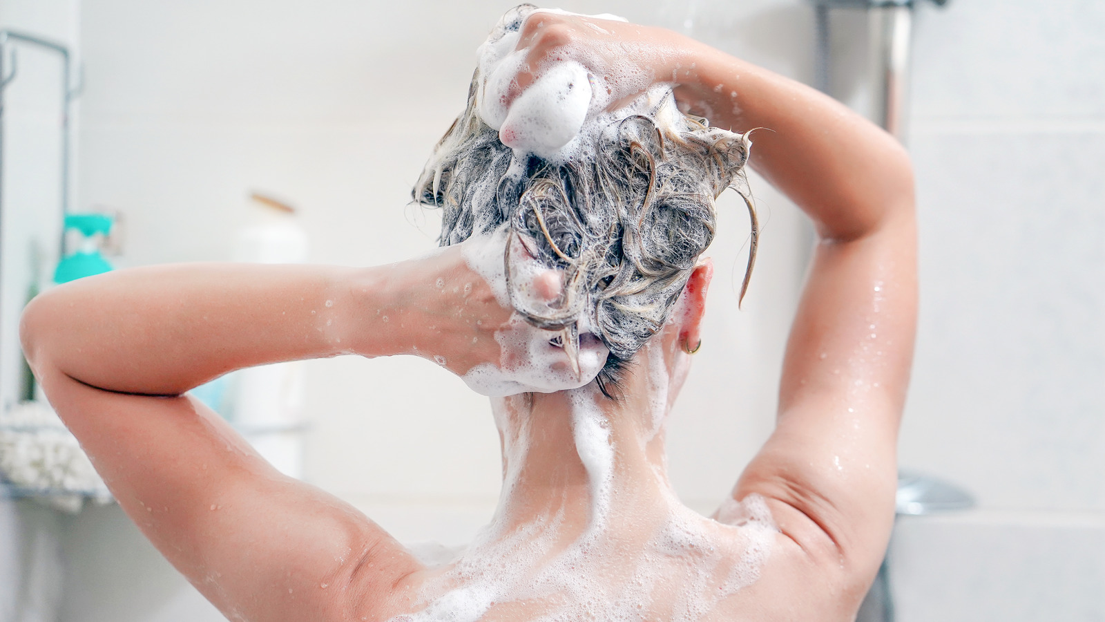 Woman getting new shower after mushroom appears