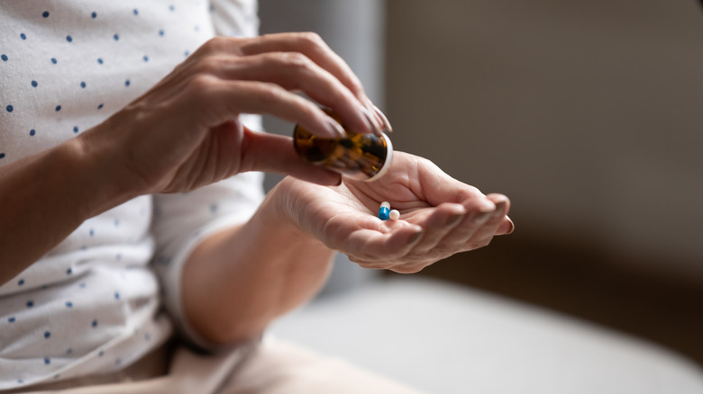 Woman taking medication