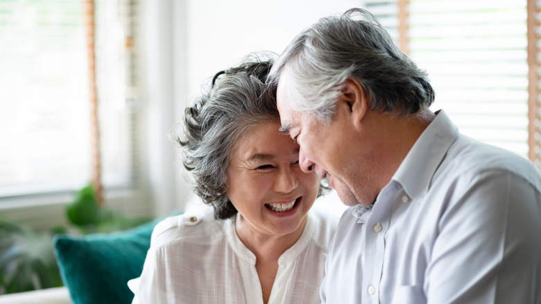 older couple sitting together