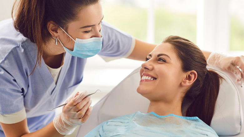 woman smiling during dental visit