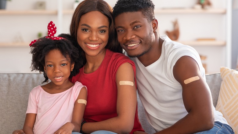 smiling vaccinated family