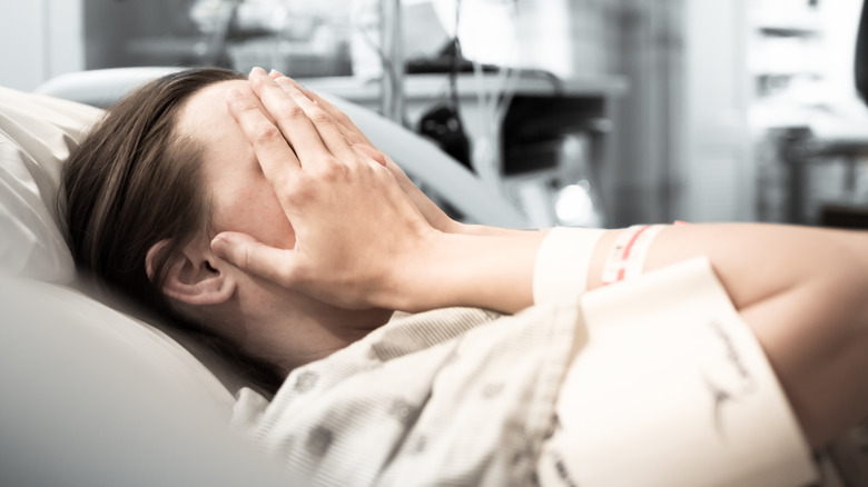 Cancer patient in hospital bed