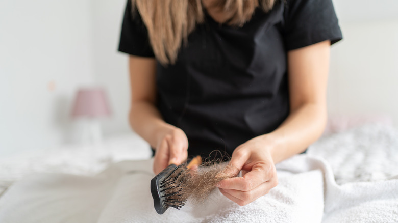 Woman dealing with hair loss