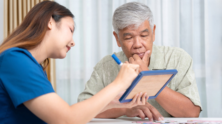 older man ungoing cognitive testing