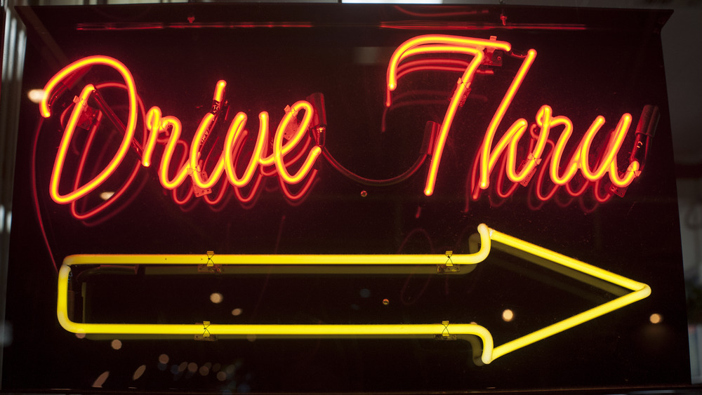 a highlighted drive-thru sign 