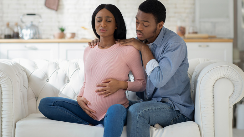 couple sitting on the sofa