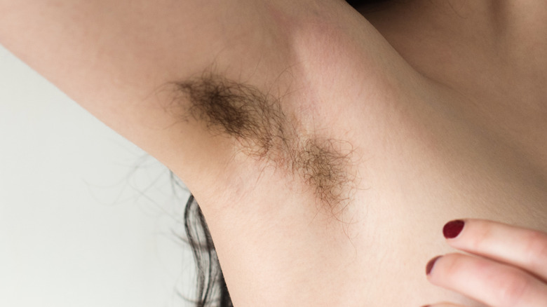 Woman with armpit hair 