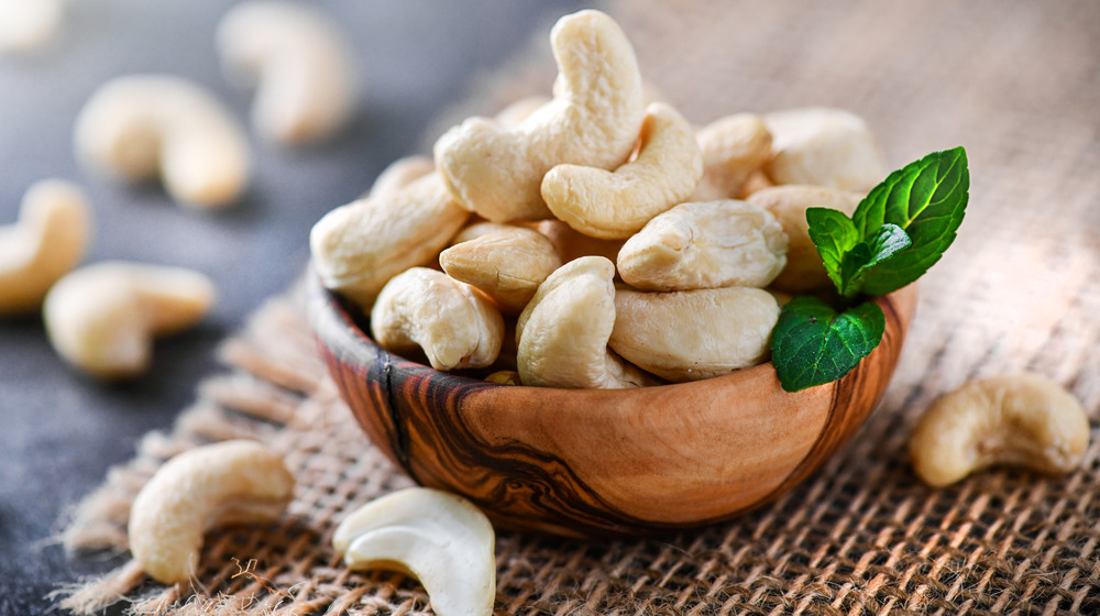 Cashew nuts in wooden bowl