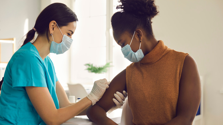 person receives vaccination shot