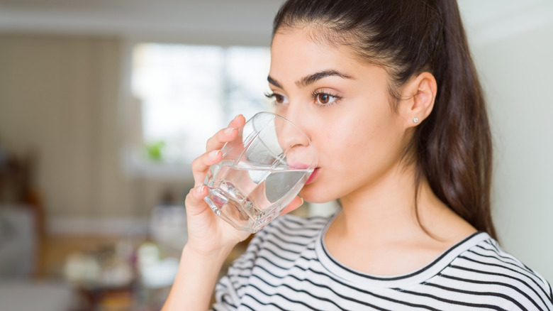 Woman drinking a glass of water