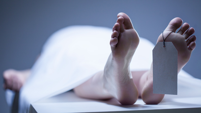 Dead body on morgue table