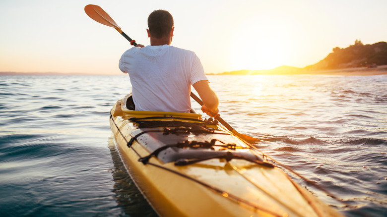 man kayaking