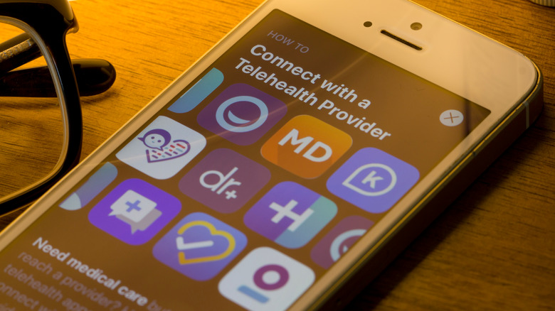 Smartphone home screen of different telehealth apps