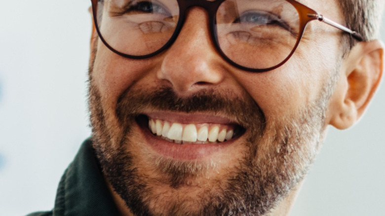 man with mustache in meeting