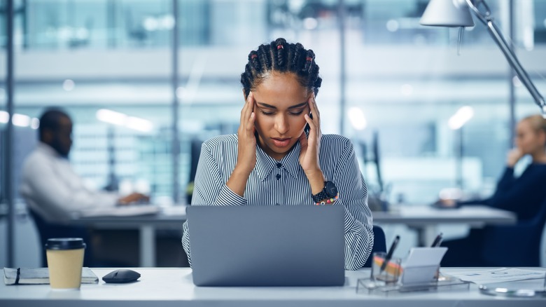 Young woman in office