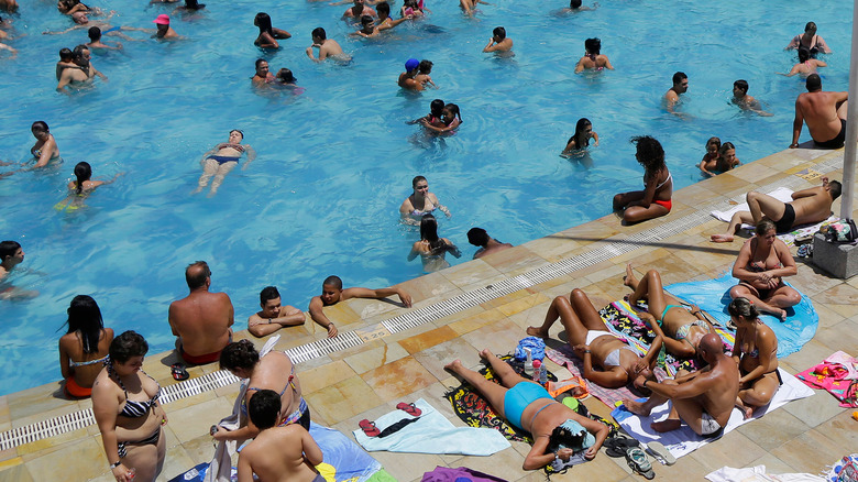 people gathered at swimming pool