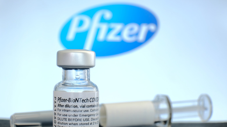 Pfizer COVID-19 vaccine vial and syringe