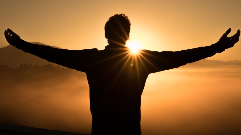 Silhouette of a man at sunrise