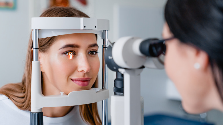 A woman at an eye exam