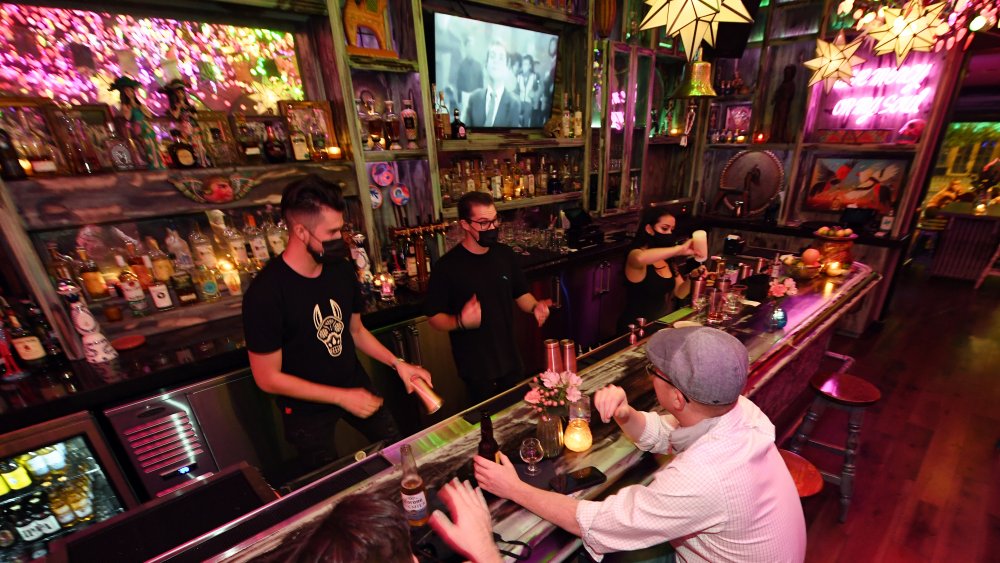 Patrons at a bar