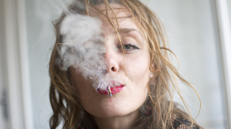 Woman smoking marijuana 